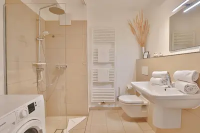 Ein Badezimmer in der Unterkunft Strandglück Haus C Strandglück Appartement 14C