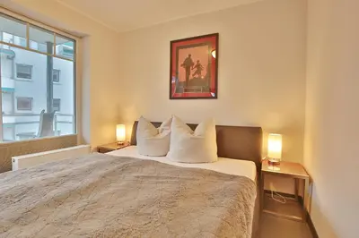 Ein Bett oder Betten in einem Zimmer der Unterkunft Strandvilla Strandvilla Appartement 14