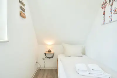 Ein Bett oder Betten in einem Zimmer der Unterkunft Bude 37 Bude 37 Appartement 8 SaM
