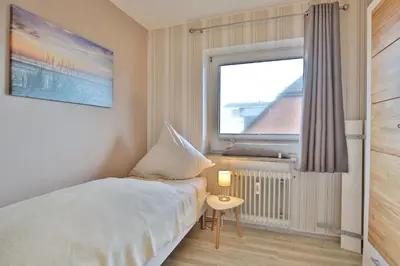 Ein Bett oder Betten in einem Zimmer der Unterkunft Villa Meeresstrand Villa Meeresstrand Appartement 7