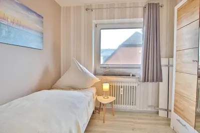 Ein Bett oder Betten in einem Zimmer der Unterkunft Villa Meeresstrand Villa Meeresstrand Appartement 7