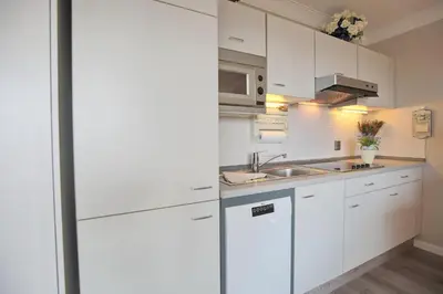 Küche/Küchenzeile in der Unterkunft Strandschlößchen Strandschlösschen Appartement 28