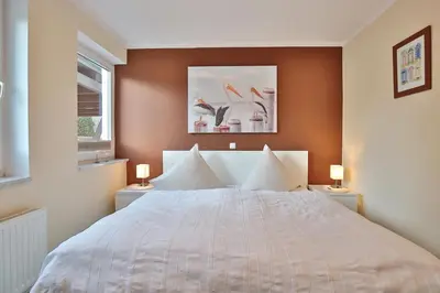 Ein Bett oder Betten in einem Zimmer der Unterkunft Barke Barke Appartement 1