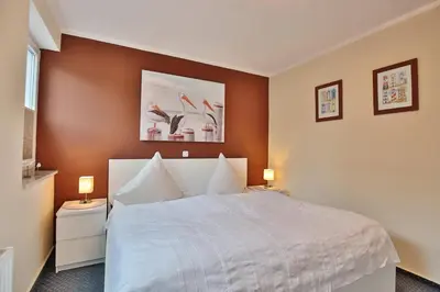 Ein Bett oder Betten in einem Zimmer der Unterkunft Barke Barke Appartement 1