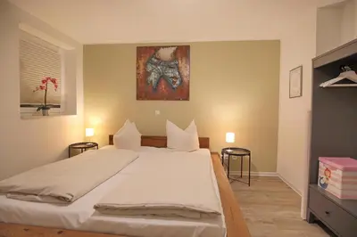 Ein Bett oder Betten in einem Zimmer der Unterkunft Bude 30 Bude 30 Tilly Appartement 2