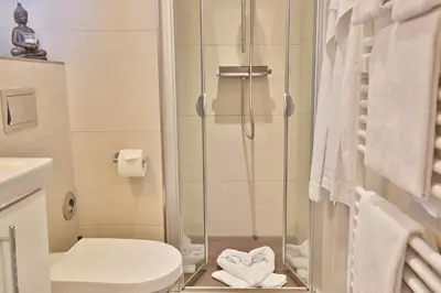 Ein Badezimmer in der Unterkunft Hanseat am Hang 3 - 5 Strandhafer Appartement 5