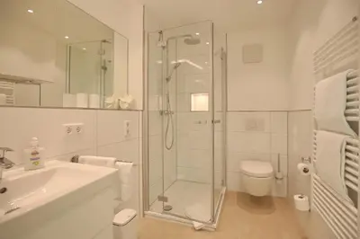 Ein Badezimmer in der Unterkunft Villa Seeperle II Herzmuschel Appartement 18