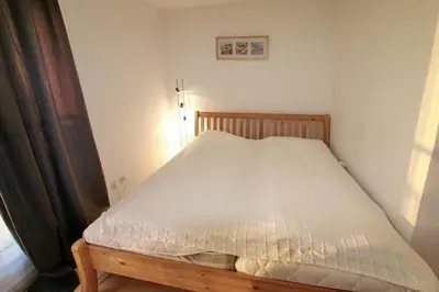 Ein Bett oder Betten in einem Zimmer der Unterkunft Seebrücke Seebrücke Appartement 22