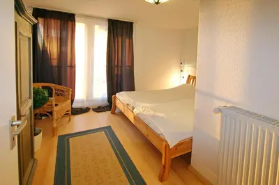 Ein Bett oder Betten in einem Zimmer der Unterkunft Seebrücke Seebrücke Appartement 22