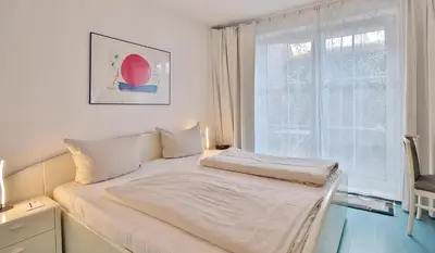 Ein Bett oder Betten in einem Zimmer der Unterkunft Seesternresidenz Seesternresidenz Appartement 16