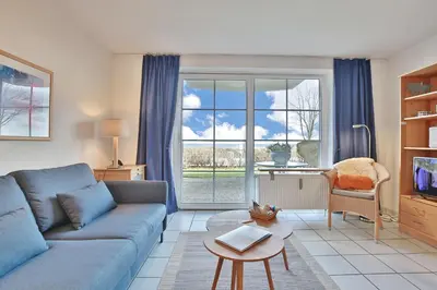 Ein Sitzbereich in der Unterkunft Strandresidenz Haffkrug Strandresidenz Appartement 3