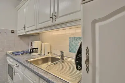 Küche/Küchenzeile in der Unterkunft Strandschlößchen Strandschlösschen Appartement 3