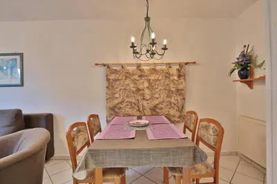 Ein Sitzbereich in der Unterkunft Strandschlößchen Strandschlösschen Appartement 3