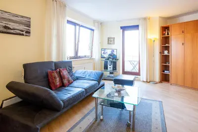 Ein Sitzbereich in der Unterkunft Strandburg Strandburg Appartement 17