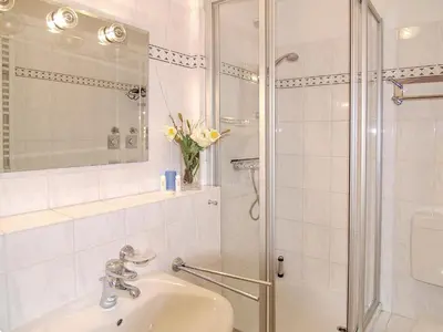 Ein Badezimmer in der Unterkunft Strandschlößchen Strandschlösschen Appartement 9