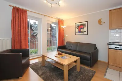 Ein Sitzbereich in der Unterkunft Residenz Alte Bergstraße Residenz Alte Bergstrasse Appartement 7