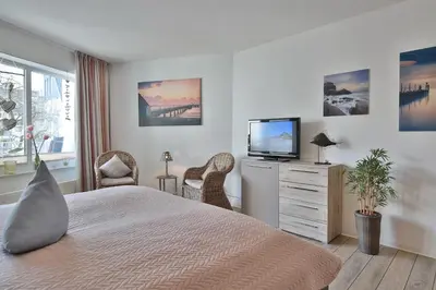Ein Bett oder Betten in einem Zimmer der Unterkunft Barke Barke Appartement 202