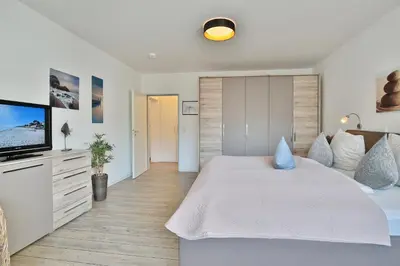 Ein Bett oder Betten in einem Zimmer der Unterkunft Barke Barke Appartement 202
