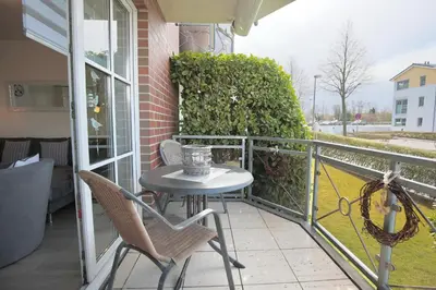 Ein Balkon oder eine Terrasse in der Unterkunft Residenz am Fischerstieg Residenz am Fischerstieg Appartement 16