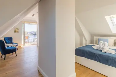 Ein Bett oder Betten in einem Zimmer der Unterkunft Haus Seerose Seerose II Appartement 16