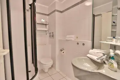 Ein Badezimmer in der Unterkunft Strandschlößchen Strandschlösschen Appartement 4