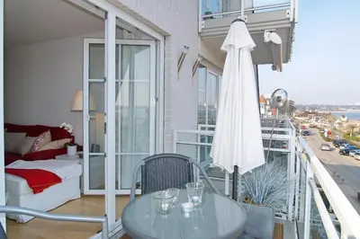 Ein Balkon oder eine Terrasse in der Unterkunft Stranddomizil Stranddomizil Appartement 13