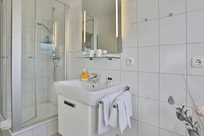 Ein Badezimmer in der Unterkunft Barke Barke Appartement 307