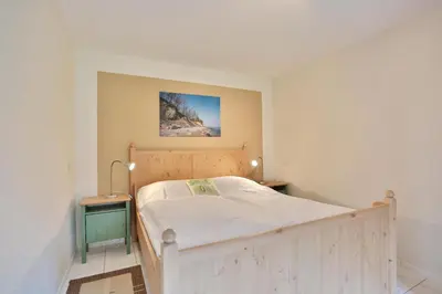 Ein Bett oder Betten in einem Zimmer der Unterkunft Haus Erlenweg Haus Erlenweg Appartement 1