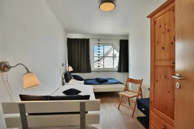 Ein Bett oder Betten in einem Zimmer der Unterkunft Ostseeblick Ostseeblick Appartement 20