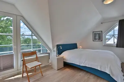 Ein Bett oder Betten in einem Zimmer der Unterkunft Ostseeblick Ostseeblick Appartement 20
