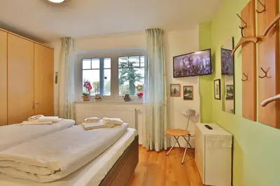 Ein Bett oder Betten in einem Zimmer der Unterkunft Strandvilla Strandvilla Appartement 13