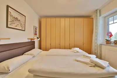 Ein Bett oder Betten in einem Zimmer der Unterkunft Strandvilla Strandvilla Appartement 13