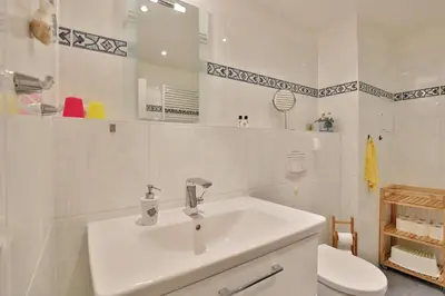 Ein Badezimmer in der Unterkunft Strandvilla Strandvilla Appartement 13