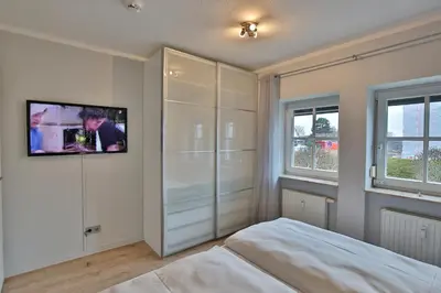 Ein Bett oder Betten in einem Zimmer der Unterkunft Möwenberg-Residenz Möwenberg-Residenz Appartement 3