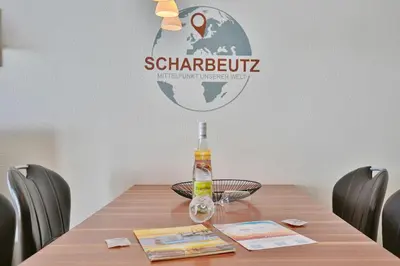 Ein Zertifikat, Auszeichnung, Logo oder anderes Dokument, das in der Unterkunft Strandvilla Strandvilla Appartement 3 ausgestellt ist