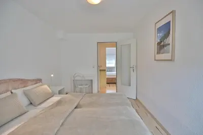 Ein Bett oder Betten in einem Zimmer der Unterkunft Haus am Ahornweg 2 Haus am Ahornweg 2C Appartement 7