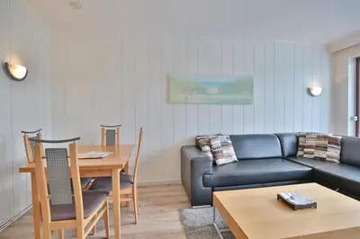 Ein Sitzbereich in der Unterkunft Haus am Ahornweg 2 Haus am Ahornweg 2C Appartement 7
