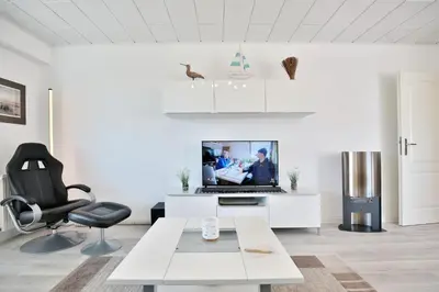 TV/Unterhaltungsangebot in der Unterkunft Strandperle Strandperle Appartement 101