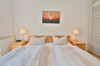 Ein Bett oder Betten in einem Zimmer der Unterkunft Feriendomizil am Konsulweg Feriendomizil am Konsulweg Appartement 2