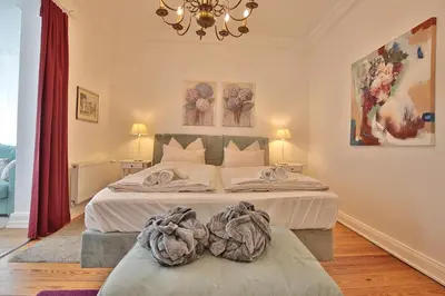 Ein Bett oder Betten in einem Zimmer der Unterkunft Villa Schöneck Villa Schöneck Appartement 2
