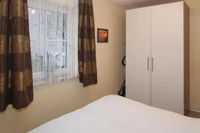 Ein Bett oder Betten in einem Zimmer der Unterkunft Ostseeblick Ostseeblick Appartement 3