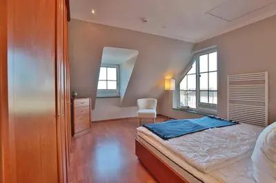 Ein Bett oder Betten in einem Zimmer der Unterkunft Residenz Alte Bergstraße Residenz Alte Bergstrasse Appartement 21
