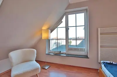 Ein Sitzbereich in der Unterkunft Residenz Alte Bergstraße Residenz Alte Bergstrasse Appartement 21