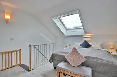 Ein Bett oder Betten in einem Zimmer der Unterkunft Haus Adria Haus Adria Appartement 31