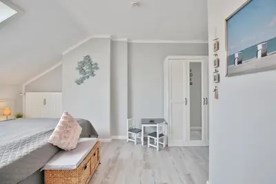 Ein Bett oder Betten in einem Zimmer der Unterkunft Haus Adria Haus Adria Appartement 31