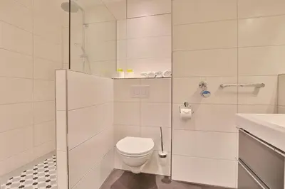 Ein Badezimmer in der Unterkunft Strandperle Strandperle Appartement 201