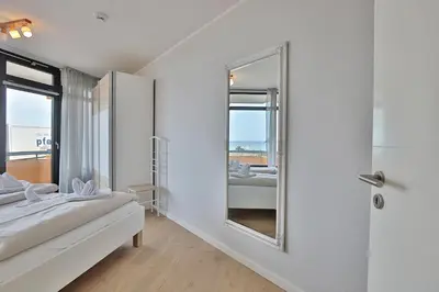 Ein Bett oder Betten in einem Zimmer der Unterkunft Berliner Hof Berliner Hof Appartement 116