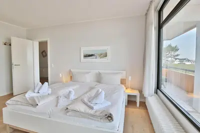 Ein Bett oder Betten in einem Zimmer der Unterkunft Berliner Hof Berliner Hof Appartement 116