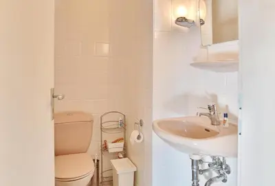 Ein Badezimmer in der Unterkunft Strandläufer Strandläufer Appartement 1