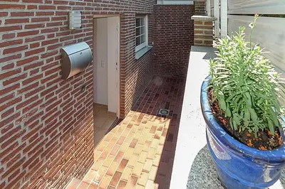 Ein Garten an der Unterkunft Strandläufer Strandläufer Appartement 2